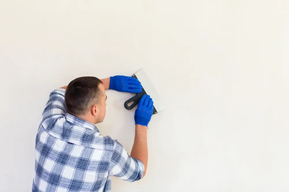 Person Painting Wall